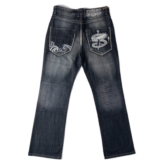 Faded dark blue jeans with decorative stitching