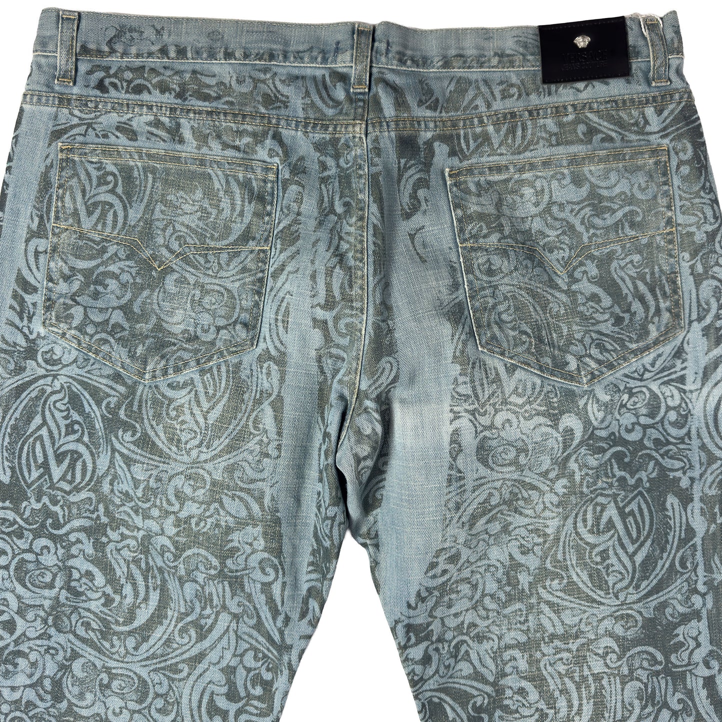versace patterned blue jeans with floral design back close up