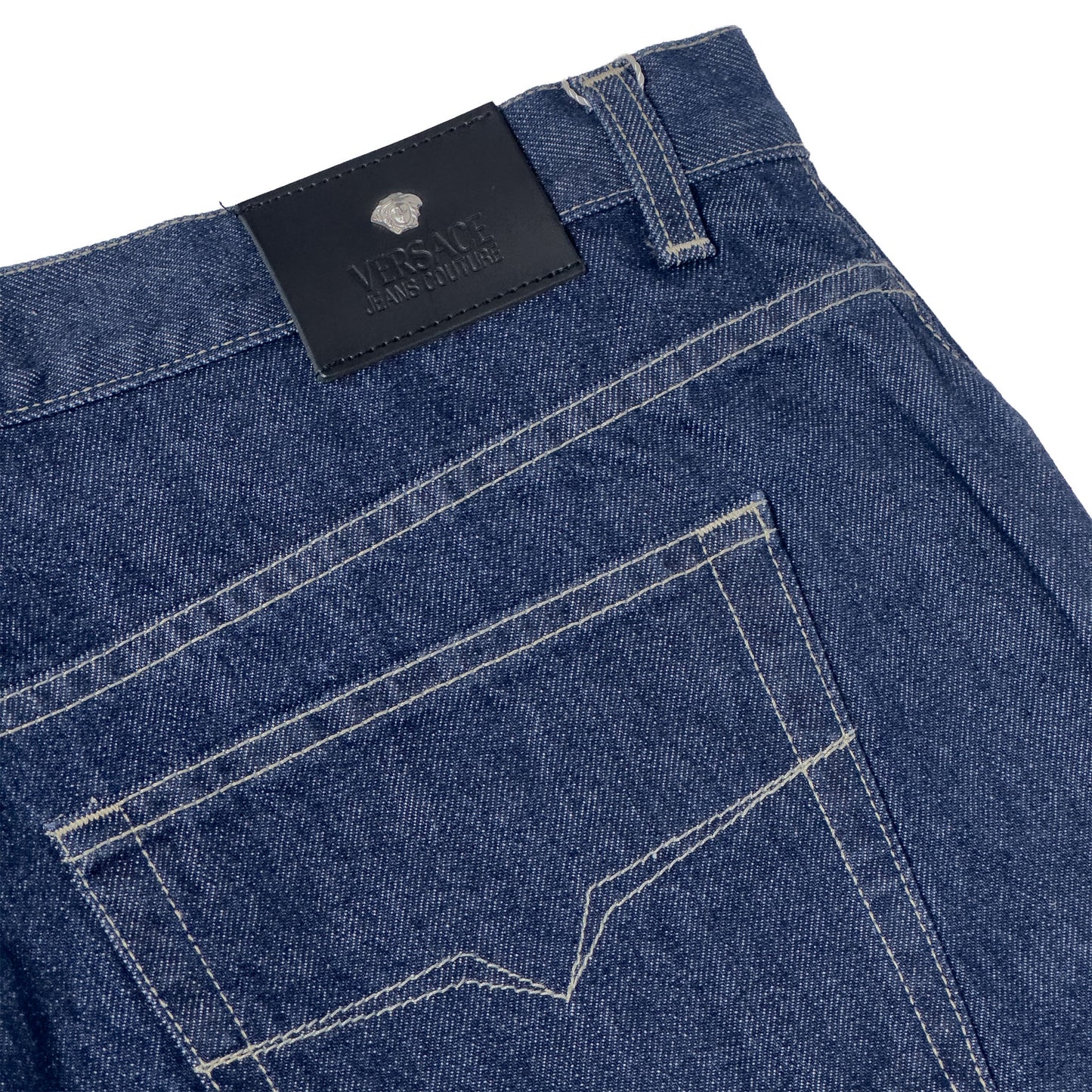close up of versace blue jeans jacron label patch
