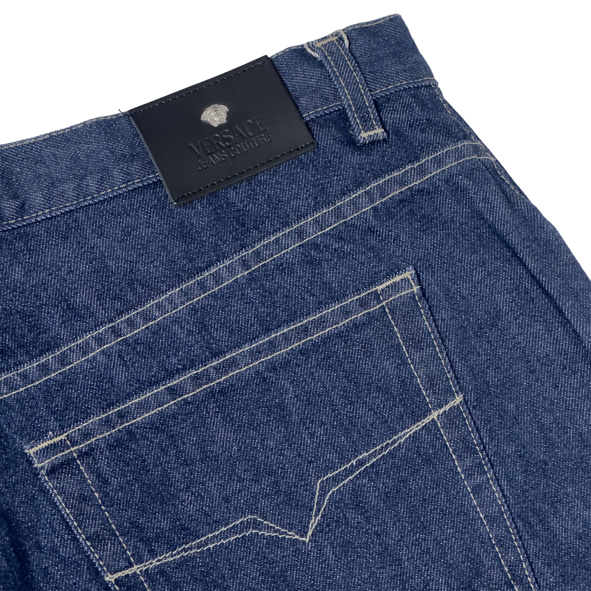 close up of versace blue jeans jacron label patch